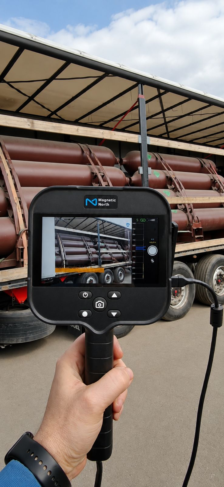 Acoustic imaging camera screening cylinders on a tube trailer
