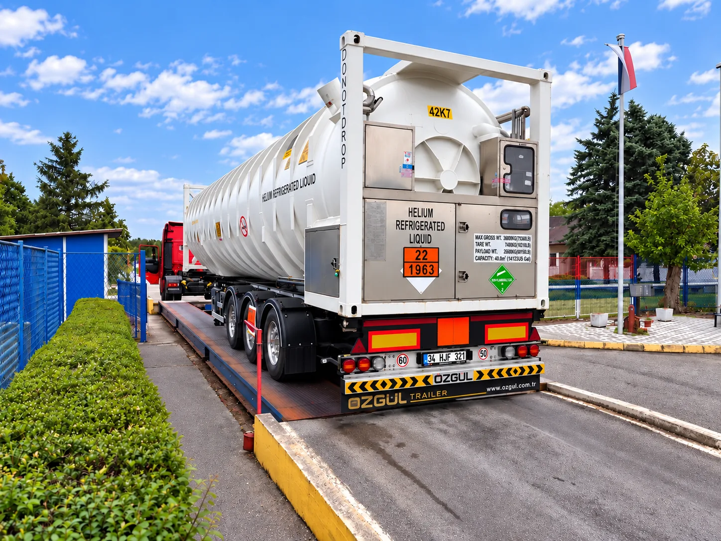 Liquid-helium ISO tank trailer positioned on a vehicle weighbridge